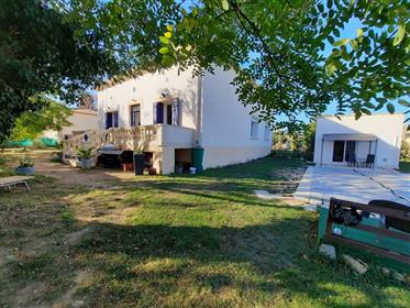 Renovated character house with 130 m² of living space, garden of 1630 m² with pool and studio.