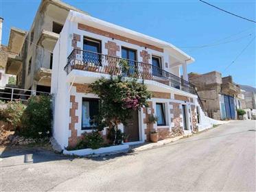 Renovated stone house with sea views in Mariou
