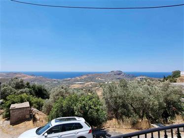 Renovated stone house with sea views in Mariou