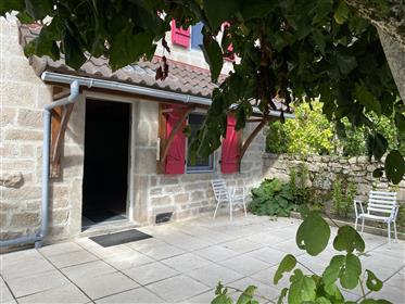 Attractive character stone with its barn, beautifu yard