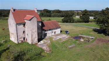 Stunning 15th century manor house with tower and 1.4 hectares attached land.