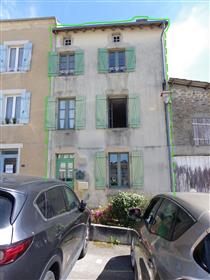 Large authentic stone house and small terrace in the heart of the village of chateauponsac
