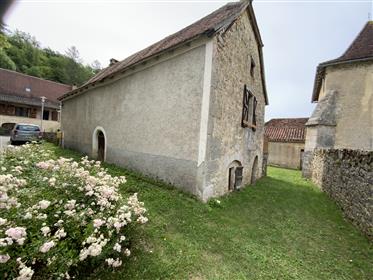 Stone house with attached garden in picturesque village 