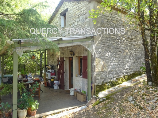 Cahors Ouest - Petite maison en pierre sur 9575m² de terrain actuellement Loué
