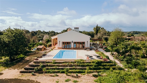 A renovated 3-bedroom villa with pool and garden