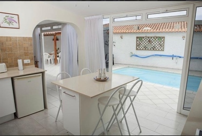 On a plot of 280 square meters, the house has a private pool in a large outdoor space, lar