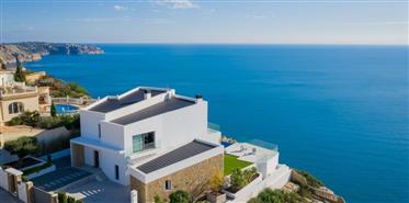 Exclusive front line luxury villa with spectacular panoramic sea views built in modern style with pr