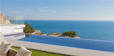 Exclusive front line luxury villa with spectacular panoramic sea views built in modern style with pr
