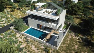 For sale is a very modern luxury villa with a pool and sea v...
