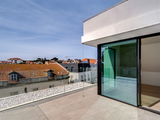 New 3 + 1 bedroom apartment with terrace and sea view in Monte do Estoril, Cascais