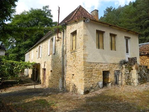 This farmhouse with barns and outbuildings, is set on almost 2 acres plot with an orchad, 