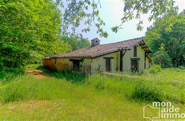 For Sale, property consisting of a house of 70 m2 in stone completely renovated which has a lot of hidden with an adjoining garage of 90 m2 on a wooded plo...