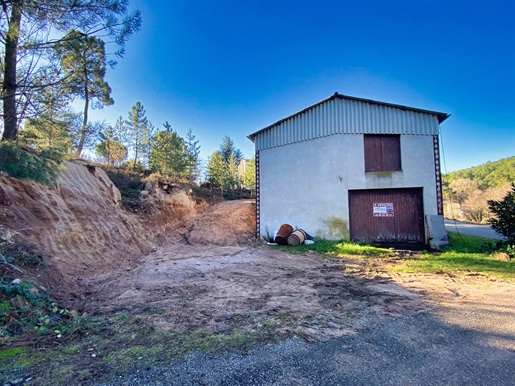 Building land of approximately 2043 m2 with 1 garage of approximately 176 m2