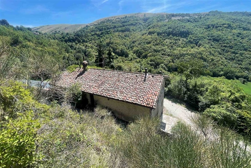 Gubbio (Pg), Loc. Petazzano: in hilly and panoramic position, stone farmhouse of 330 sqm o...