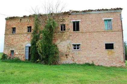 Large farmhouse at the foothill of Treia. This farmhouse was originally built in stone and
