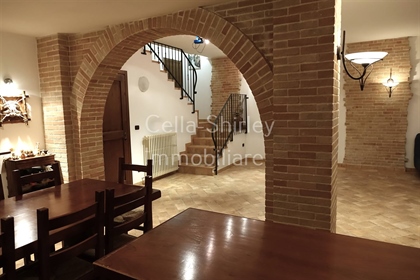 Attractive brick-built property on 3 floors with garden and double garage in Monte Giorgio