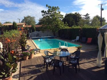 6 bedroom/5 bathroom renovated house with swimming pool, gardens and land. Income Potentia